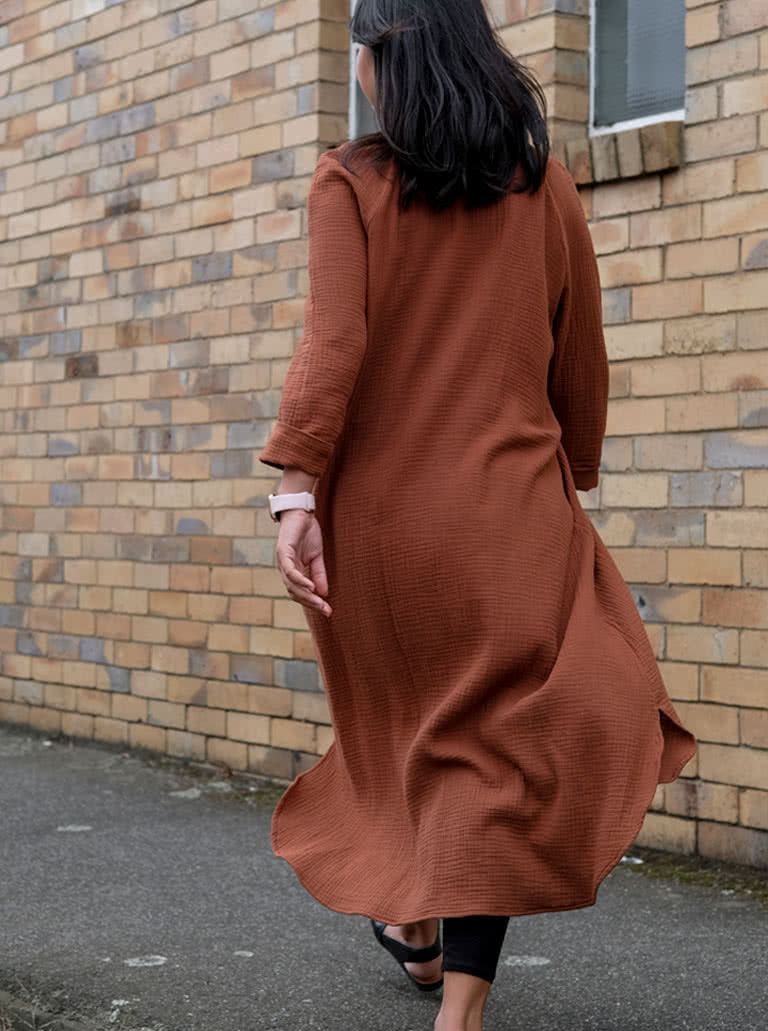 Anais Woven Dress By Style Arc - Long line shirt dress featuring long sleeves, shirt tails, collar and pockets.