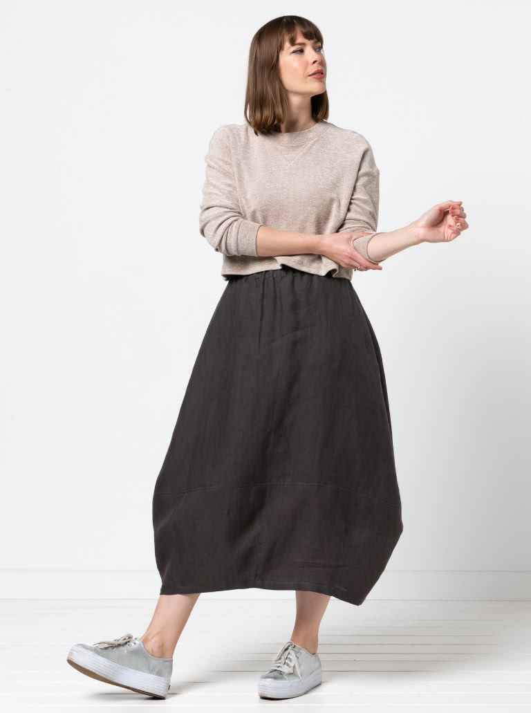 Ayla Woven Skirt By Style Arc - Cocoon shape elastic waist skirt with a darted hem and inseam pockets