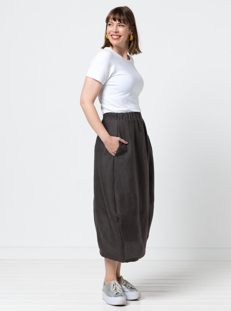 Ayla Woven Skirt By Style Arc - Cocoon shape elastic waist skirt with a darted hem and inseam pockets