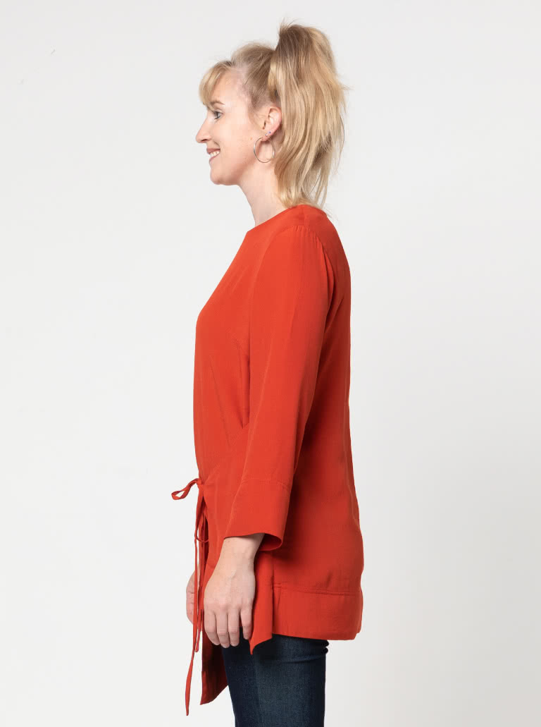 Bessie Woven Tunic By Style Arc - Woven long line top featuring a fashionable tied front over lay and 7/8th length sleeves.