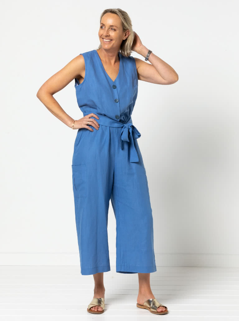 Birdie Jumpsuit By Style Arc - Jumpsuit featuring a buttoned front opening, 2 neck shapes, one round & one "V". Wide 7/8" leg length, two pocket options and a tie belt.