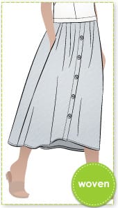 Bonnie Woven Skirt By Style Arc - The Bonnie Woven Skirt sewing pattern is a mid-length skirt with a curved front waistband, elasticated back, slight front gathers, and a functional button front. Optional inseam pockets. Make with contrast topstitching for an elevated look.