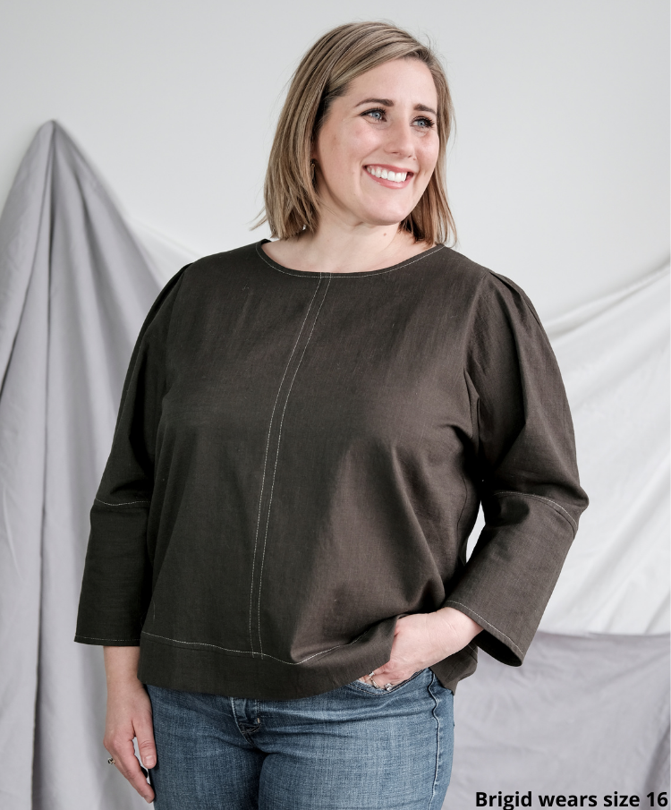 Brigid wearing Florence woven top in khaki in size 16