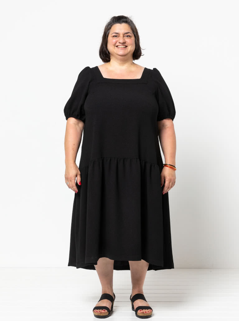 Clementine Woven Top And Dress By Style Arc - Top: A-line top featuring a square neck and puffed elbow length sleeves. Dress: Calf length dress with one gathered lower tier.