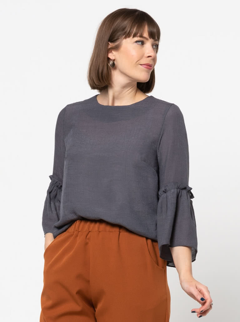 Effie Woven Top By Style Arc - Slightly shaped round neck top featuring a 3/4 length sleeve finished off with a wide frill.