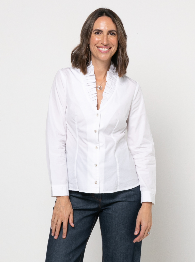 Francesca Woven Shirt By Style Arc - Button front blouse with ruffle neck, two-piece collar, long sleeve with cuffed sleeves.