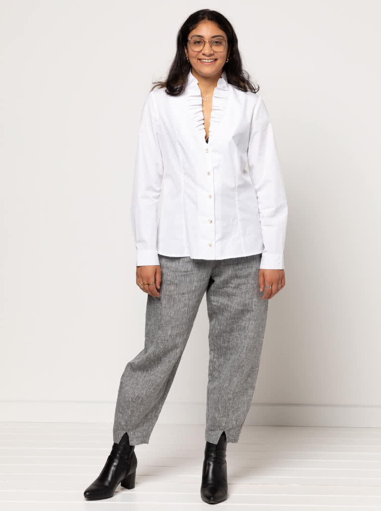 Francesca Woven Shirt By Style Arc - Button front blouse with ruffle neck, two-piece collar, long sleeve with cuffed sleeves.