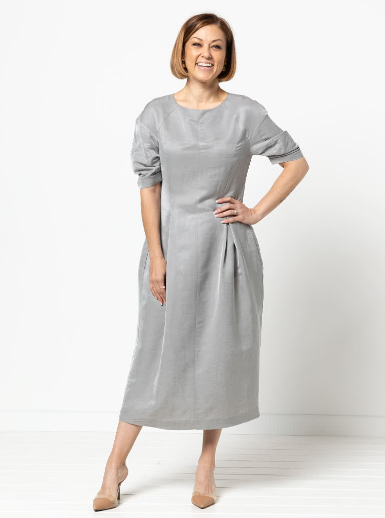 Gertrude Designer Dress By Style Arc - This is a designer dress featuring a fitted bodice, dropped shoulder line, tucked sleeves, inverted pleats and a back zip.