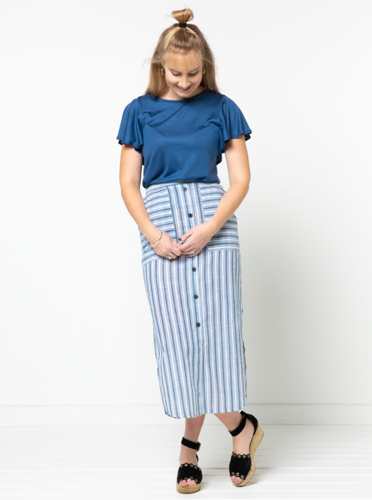 Indigo Maxi Skirt Sewing Pattern By Style Arc - Maxi skirt with elastic waist, faux button opening and patch pockets.