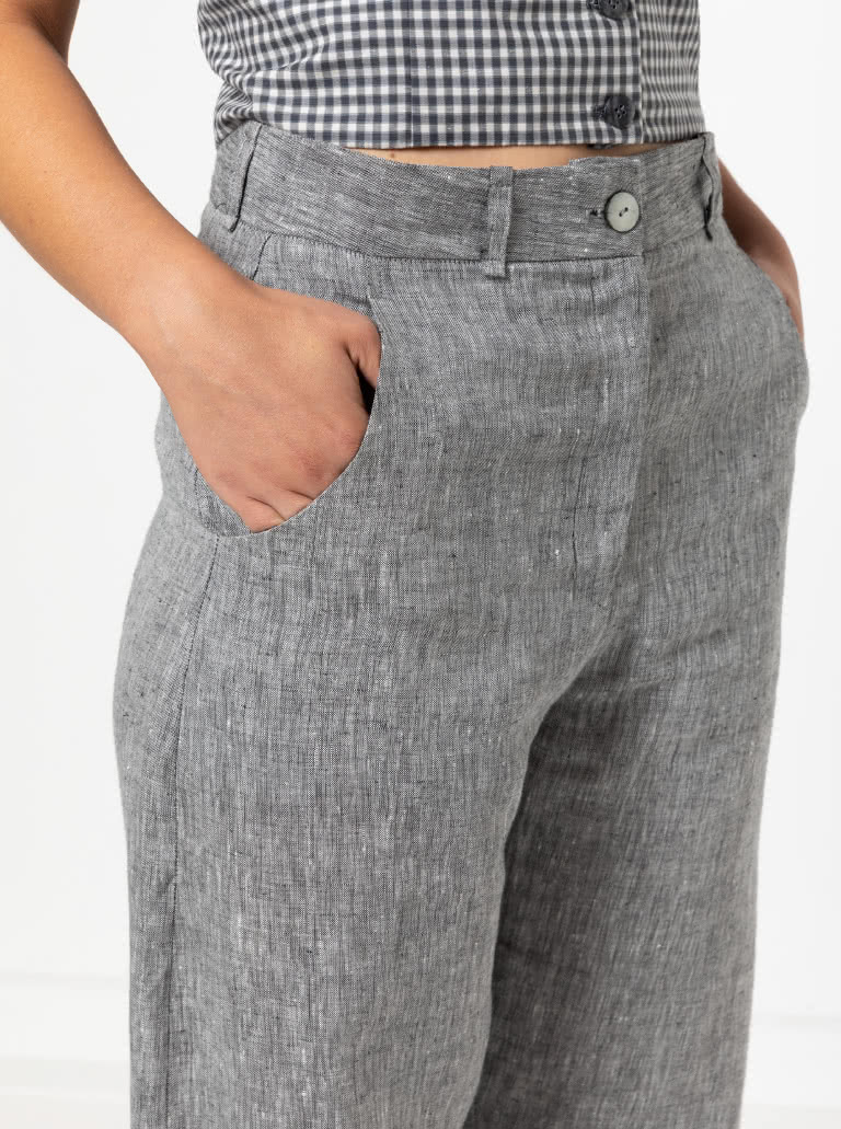 Kew Woven Pant By Style Arc - Waisted, fly front pant with a shaped leg, interesting hem and angled pockets.