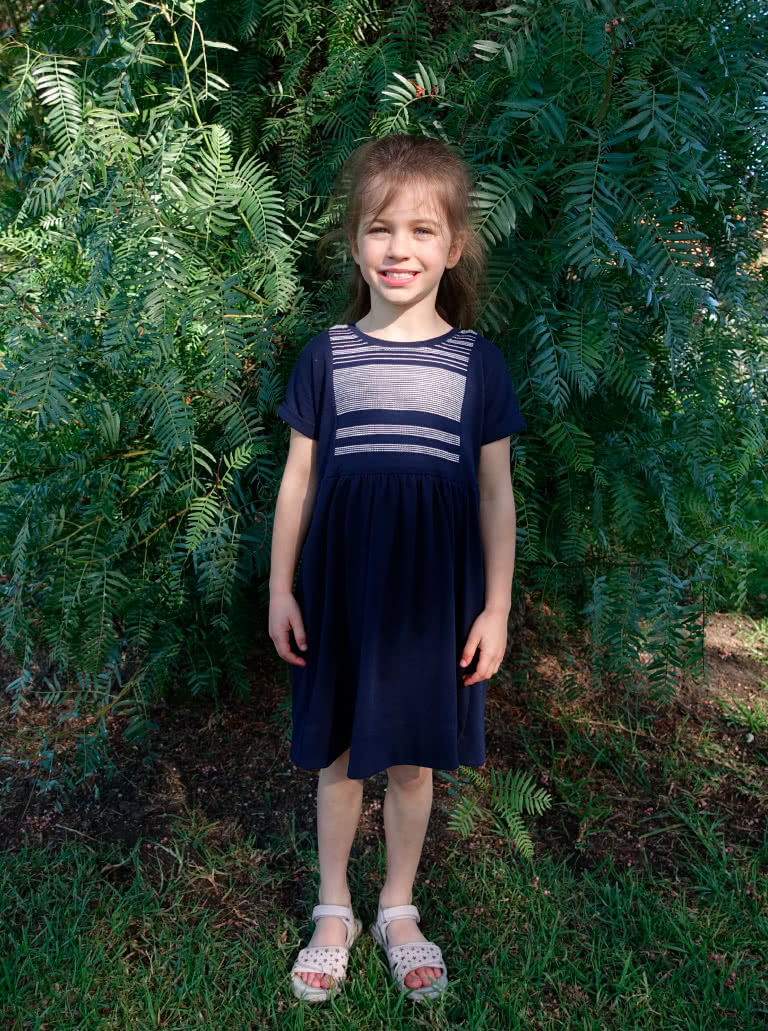 Lacey Kids Dress By Style Arc - Easy slip on dress with an extended shoulder, square line bodice and slightly gathered skirt.