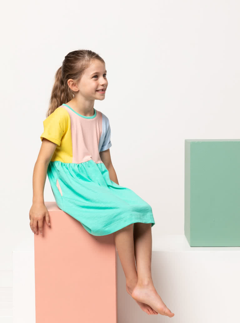 Lacey Kids Dress By Style Arc - Easy slip on dress with an extended shoulder, square line bodice and slightly gathered skirt.