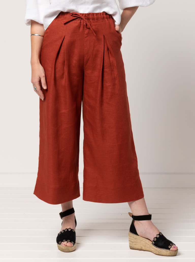 Milan Woven Pant By Style Arc - Wide leg, pull on pant, ankle length, inverted pleats, elastic waist with drawstring tie.