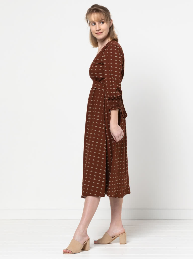 Philomena Woven Dress By Style Arc - Fitted "V" neck dress featuring a shirred waist insert completed with a tie belt. "A" line skirt and 3/4 length sleeves finished off with a shirred cuff.