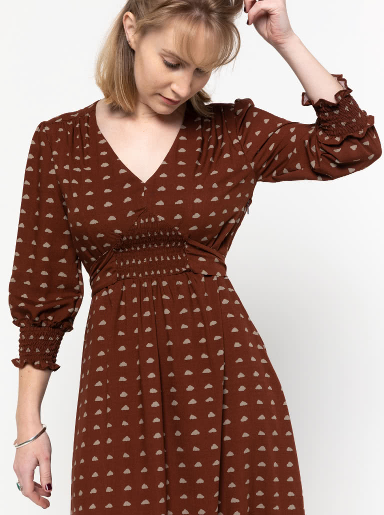 Philomena Woven Dress By Style Arc - Fitted "V" neck dress featuring a shirred waist insert completed with a tie belt. "A" line skirt and 3/4 length sleeves finished off with a shirred cuff.