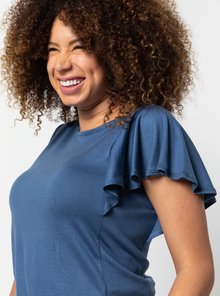 Posie Knit Top By Style Arc - Knit top featuring sleeve flounces, round neck and side panels.