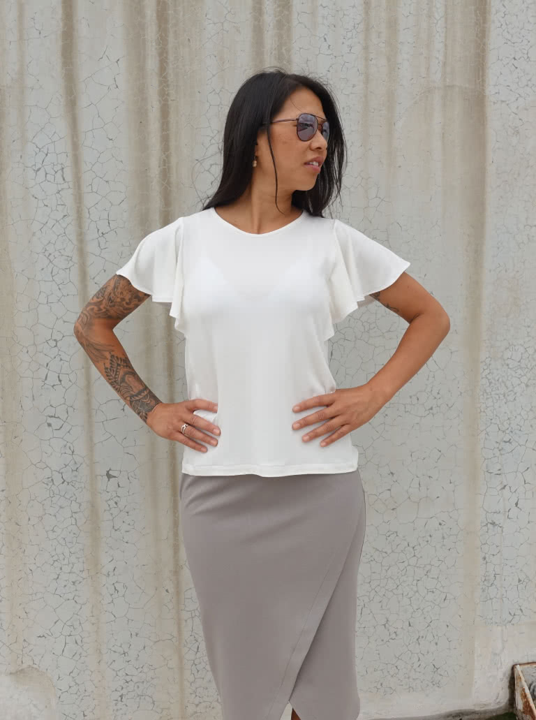Posie Knit Top By Style Arc - Knit top featuring sleeve flounces, round neck and side panels.