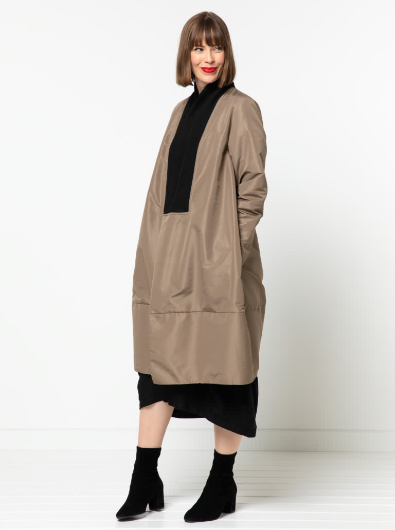 Rana Designer Coat By Style Arc - Designer coat with an interesting shaped silhouette and two collar options, wrap front and inseam pockets.