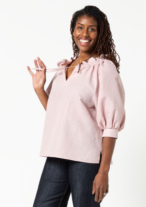 Reynolds Woven Top By Style Arc - Relaxed fit, ruffle neck, elbow length raglan sleeved top.
